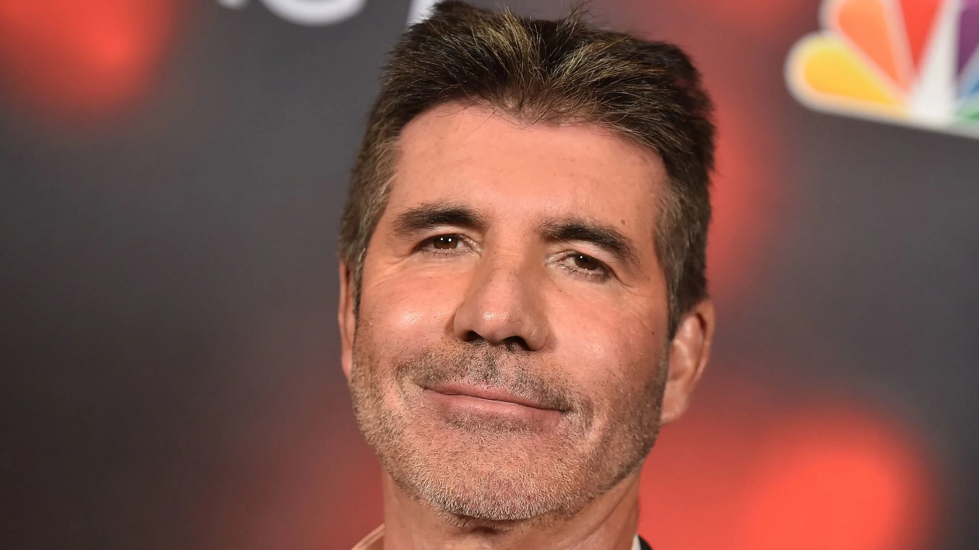 Simon Cowell – The Sharp Voice Behind X Talent